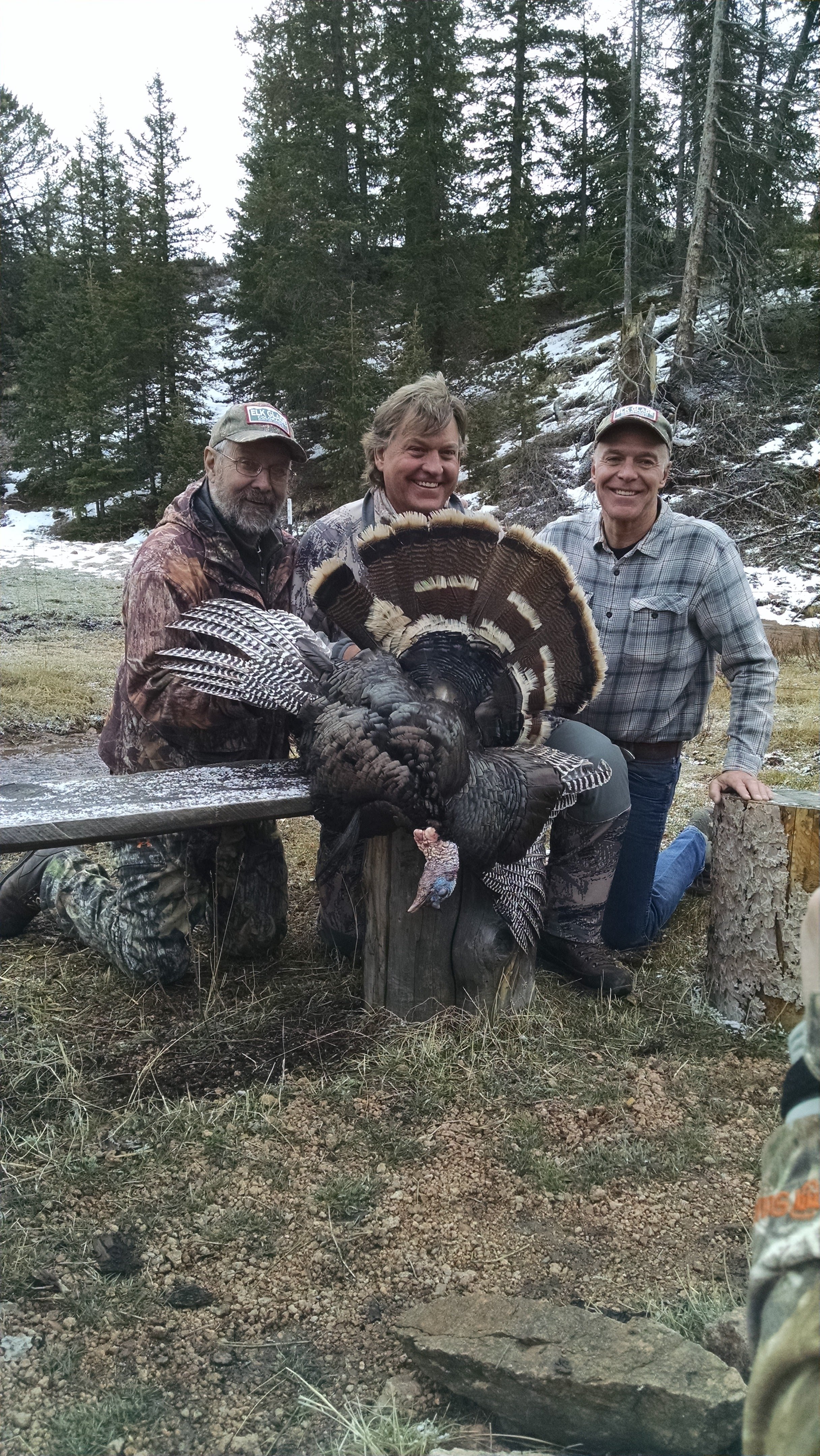 Three hunters at Elk Glade with a spring tom turkey